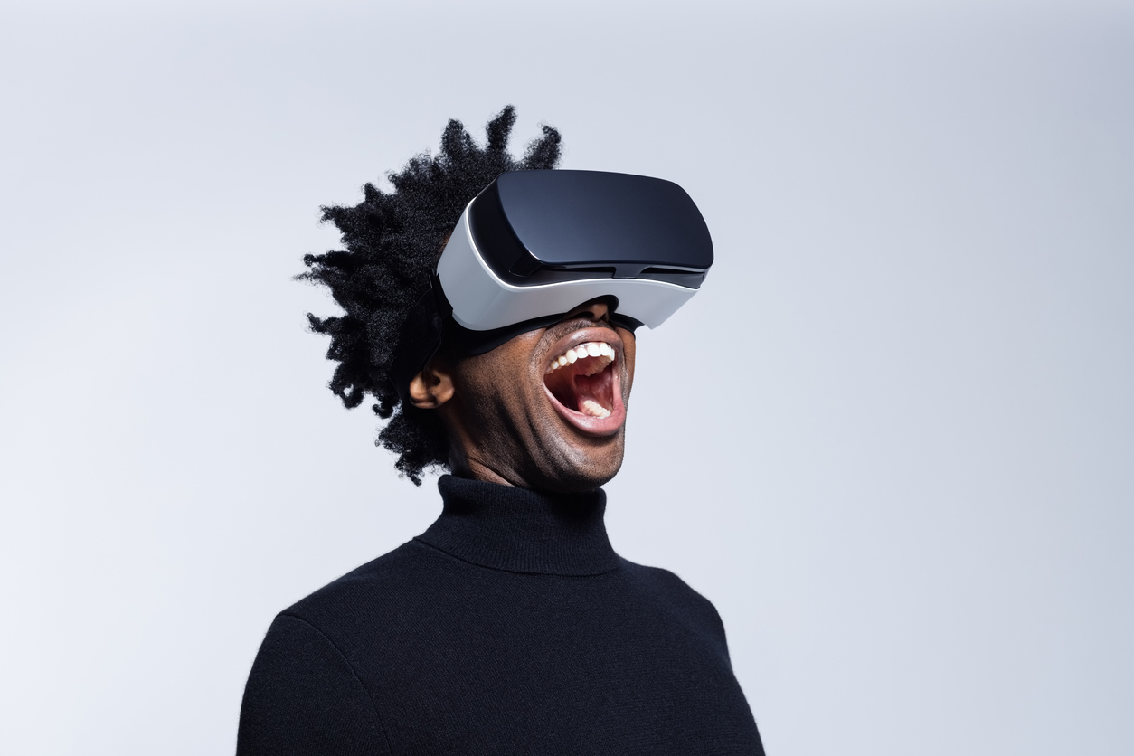 black man with VR headset with mouth open wow