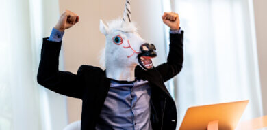 UX unicorn man in costume